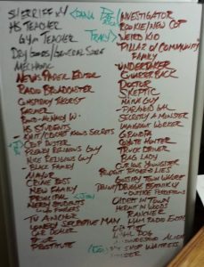 picture of  white board with an extensive list of characters