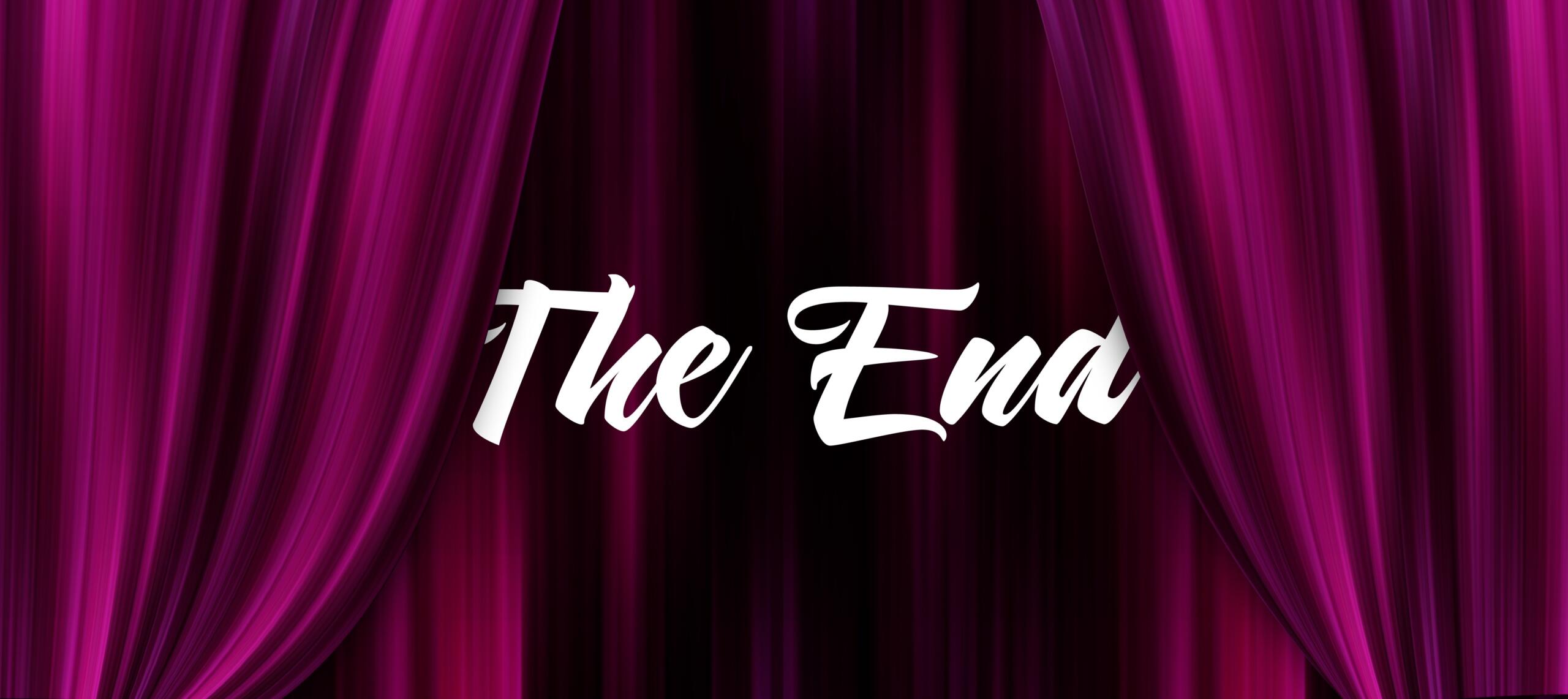 A set of purple curtains being drawn revealing the words, "The End".